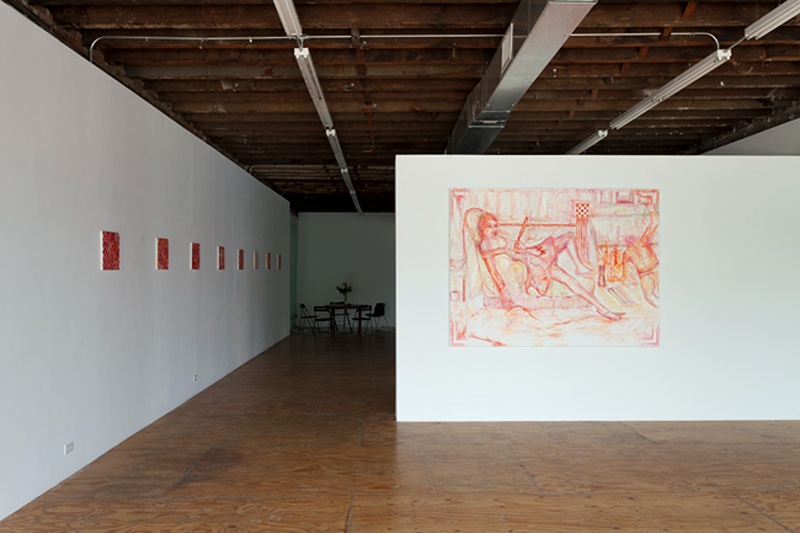 installation image of red paintings